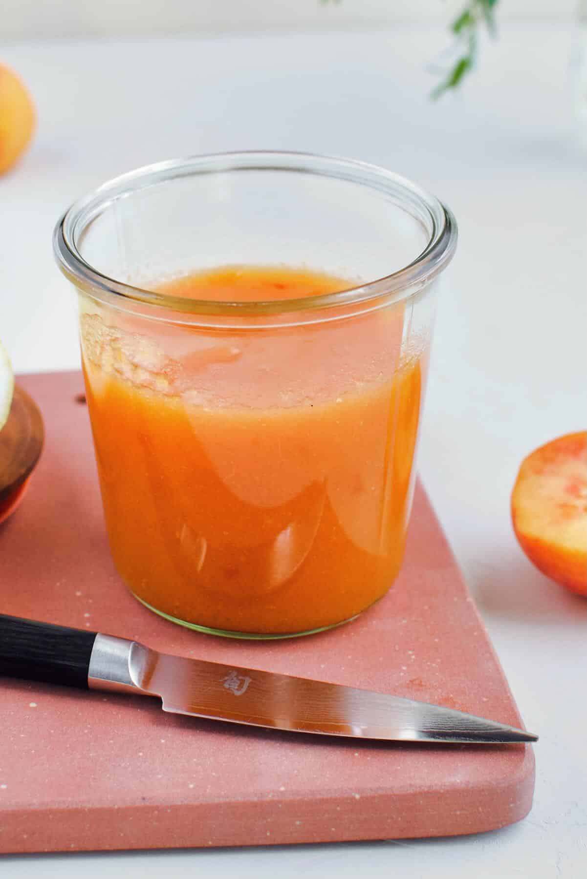 Peach Jam Recipe, in a jar cooling.