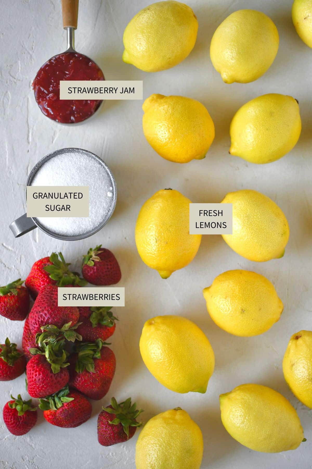 Ingredients needed to make Strawberry Lemonade.