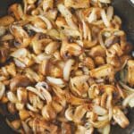Sautéed Mushrooms and Onions, finished in the skillet, ready to be eaten.