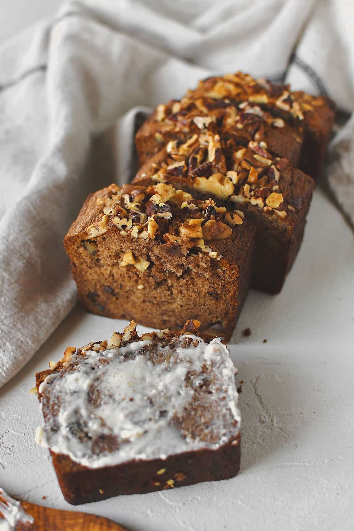 Sliced Starbucks Banana Bread Recipe ready to be enjoyed and topped with a smear of butter.