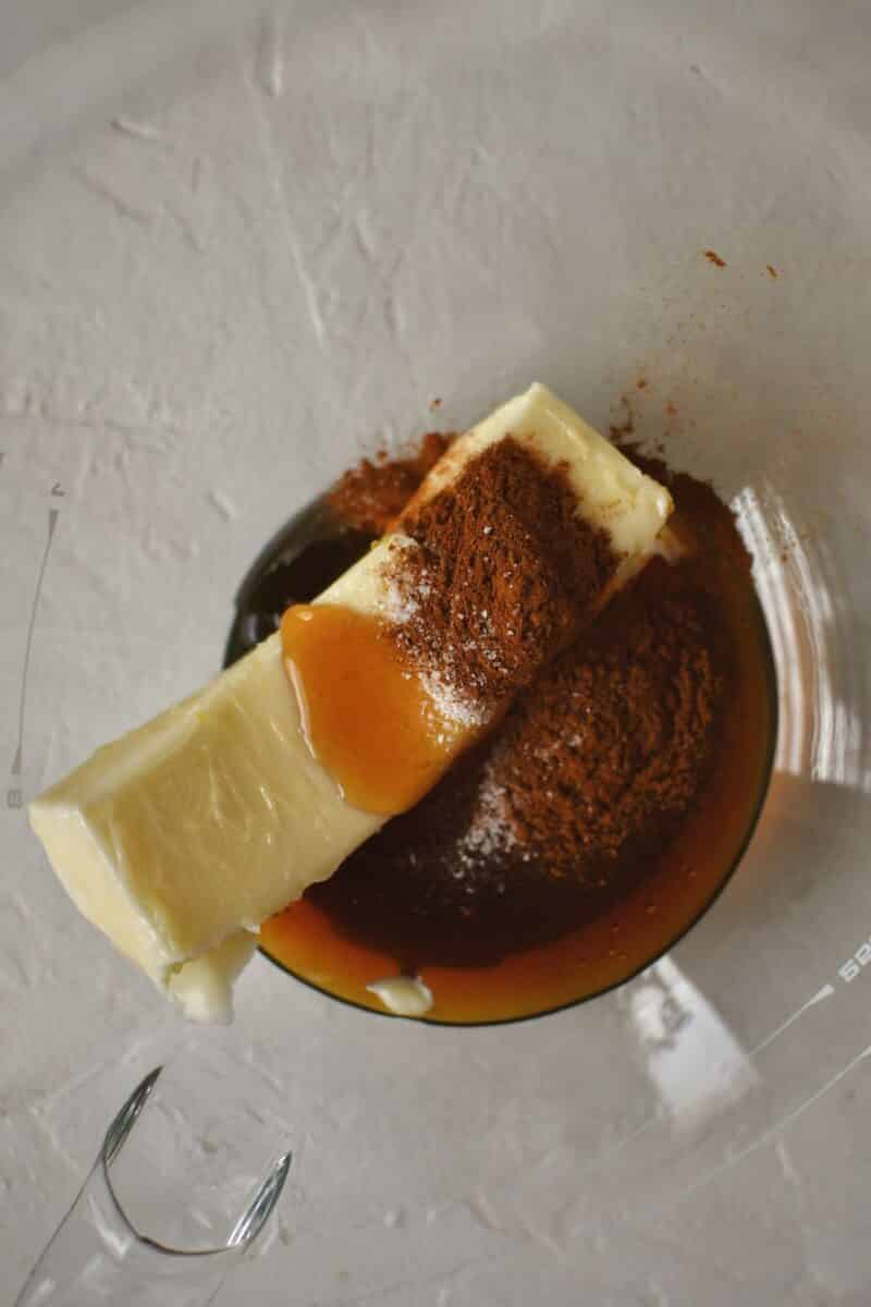 Butter, honey, cinnamon, and salt in the bowl of a stand mixer, before whipping.