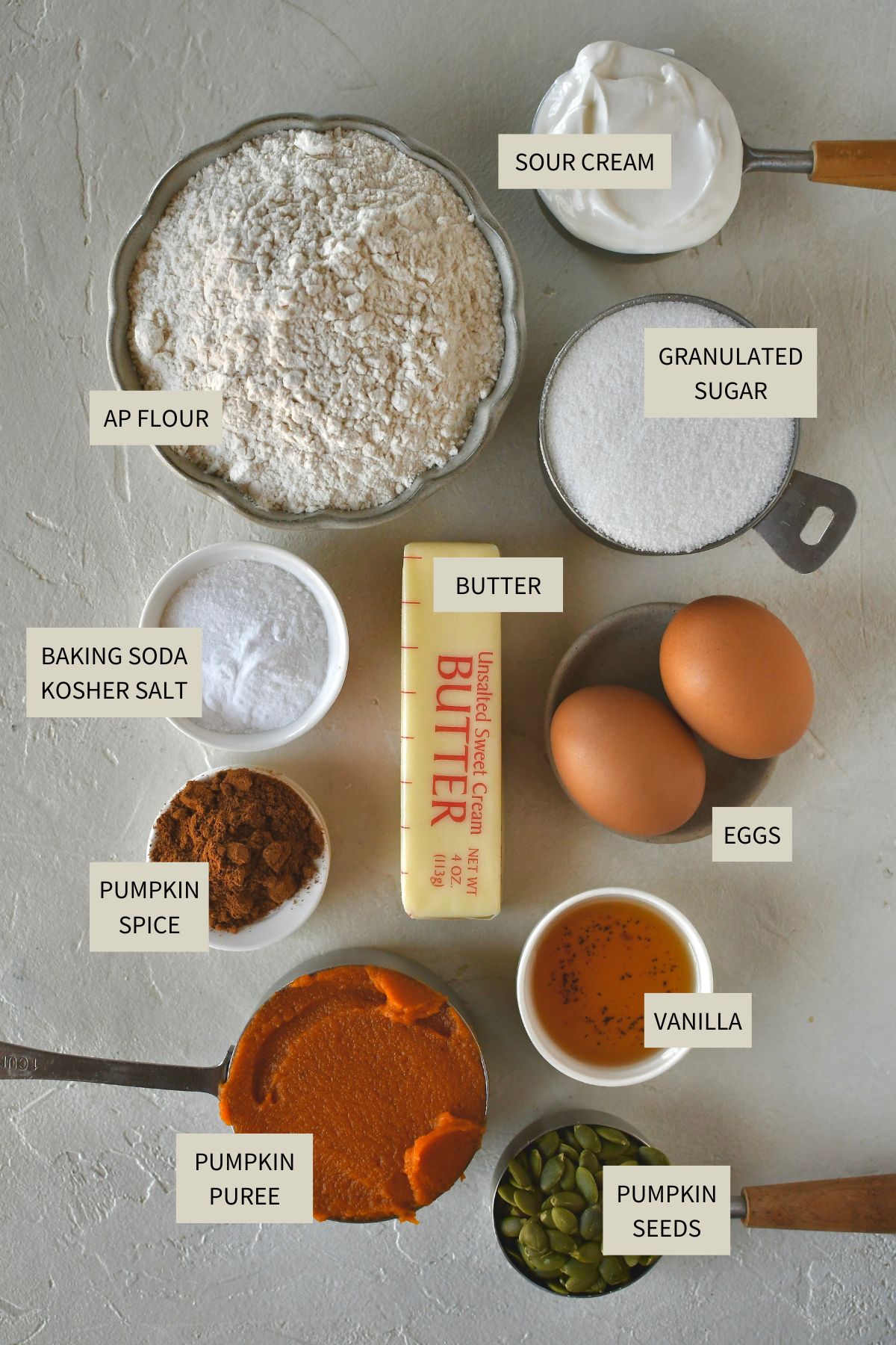 Ingredients needed to make Pumpkin Spice Bread.