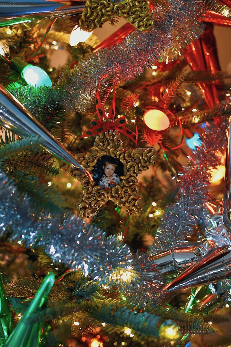 Macaroni Start Pasta Christmas Ornament, photo of Greyson on a beautifully decorated tree.