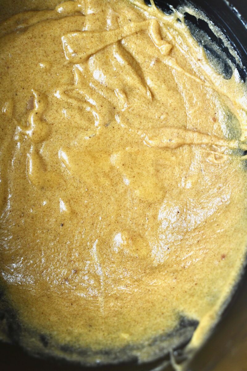 Butter, sugars, and eggs beat together to for the base of the banana bread batter.