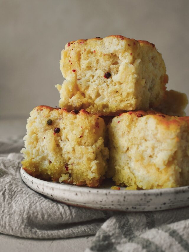 Cooked Olive Oil Swim Biscuits on a plate, after baking and cut, then placed on a plate.