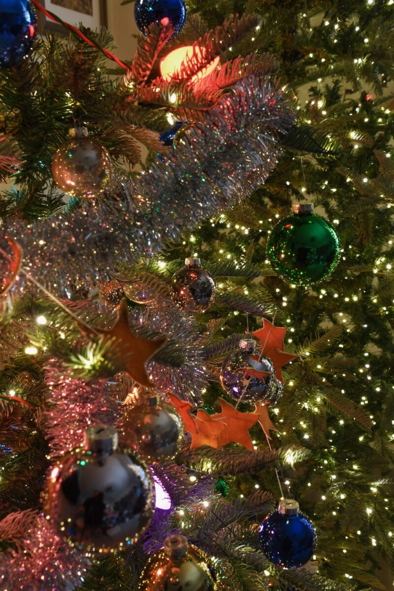 Orange Peel Star Garland strung up on nostalgically trimmed a tree.